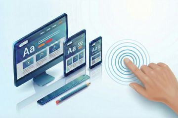 uno schermo PC, un tablet, uno smartphone e una mano che dà connettività